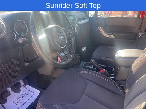 Used 2013 Jeep Wrangler Unlimited Sahara w/ Dual Top Group AWD/4WD image 9
