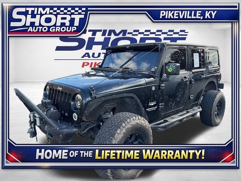 Used 2012 Jeep Wrangler Unlimited Sahara w/ Dual Top Group image 1