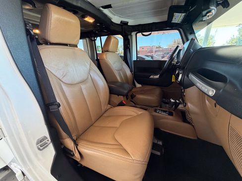 Used 2013 Jeep Wrangler Unlimited Sahara w/ Dual Top Group AWD/4WD image 16