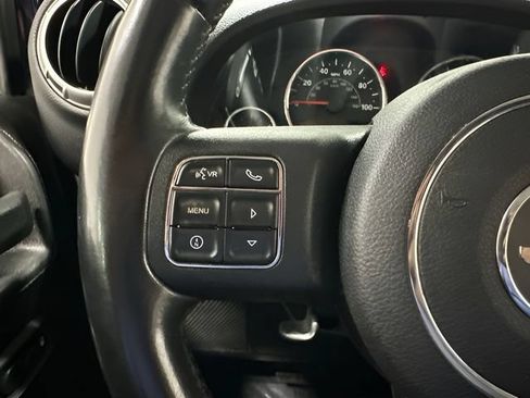 Used 2013 Jeep Wrangler Unlimited Sahara w/ Dual Top Group AWD/4WD image 16