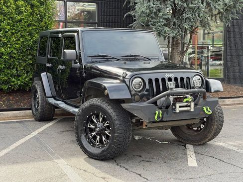 Used 2013 Jeep Wrangler Unlimited Sahara w/ Connectivity Group AWD/4WD image 7