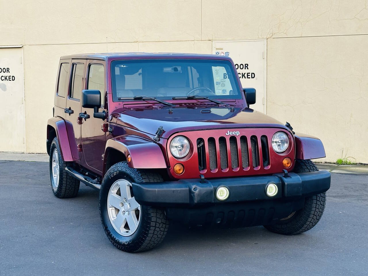 Used 2007 Jeep Wrangler Unlimited Sahara w/ Dual Top Group AWD/4WD image 1
