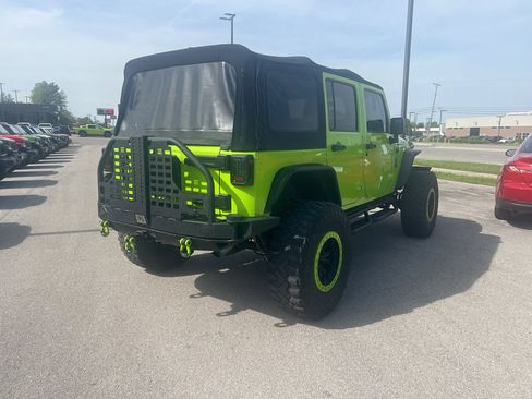 Used 2012 Jeep Wrangler Unlimited Rubicon w/ Dual Top Group image 6