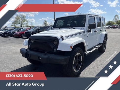 Used 2014 Jeep Wrangler Unlimited Sahara AWD/4WD image 1