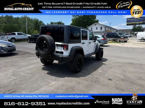 Used 2013 Jeep Wrangler Unlimited Sport w/ Dual Top Group AWD/4WD image 6