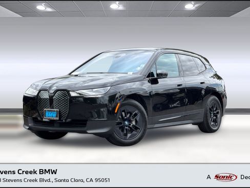 Used 2024 BMW iX xDrive50 w/ Premium Package AWD/4WD image 1