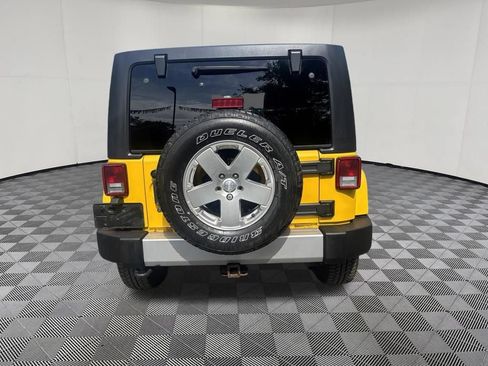 Used 2011 Jeep Wrangler Unlimited Sahara w/ Dual Top Group AWD/4WD image 13