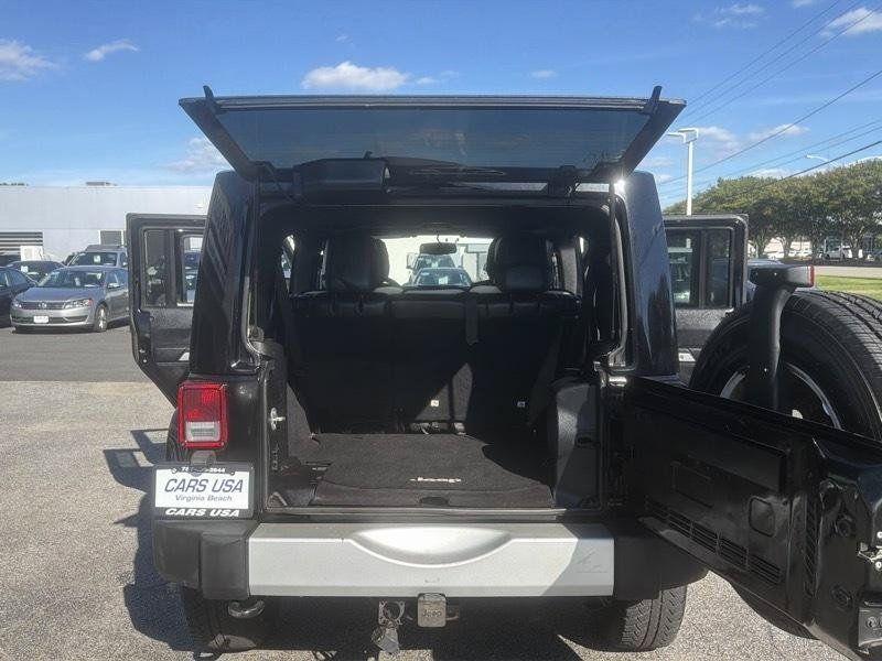 Used 2014 Jeep Wrangler Unlimited Sahara w/ Dual Top Group AWD/4WD image 14