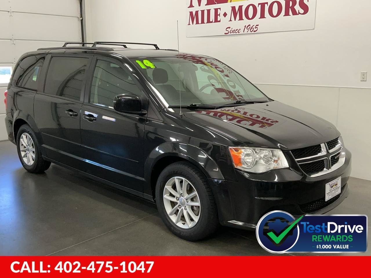 Used 2014 Dodge Grand Caravan SXT w/ Rear Park Assist Package FWD image 1