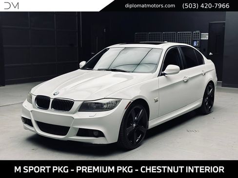 Used 2011 BMW 335i xDrive Sedan AWD/4WD image 1