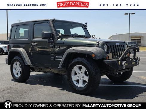 Used 2011 Jeep Wrangler Sport w/ Black Appearance Group AWD/4WD image 1