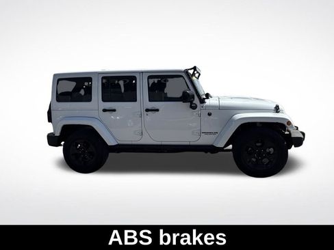 Used 2015 Jeep Wrangler Unlimited Sahara AWD/4WD image 7