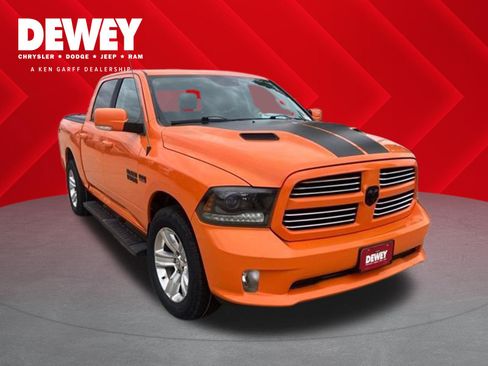 Used 2015 RAM 1500 Sport w/ Ignition Orange Sport Package AWD/4WD image 1