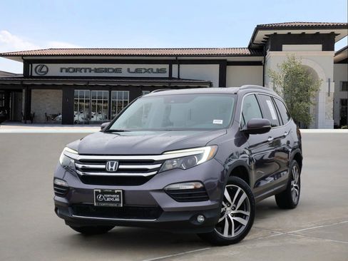 Used 2016 Honda Pilot Touring image 1