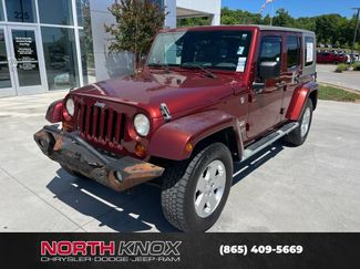 Used 2010 Jeep Wrangler Unlimited Sahara w/ Dual Top Group AWD/4WD video 1