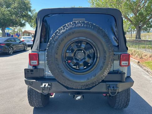 Used 2014 Jeep Wrangler Unlimited Sahara w/ Connectivity Group AWD/4WD image 11