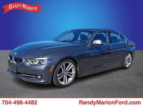 Used 2017 BMW 330i xDrive Sedan w/ Technology Package AWD/4WD image 1