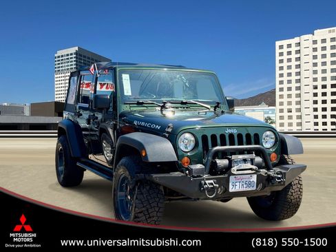 Used 2012 Jeep Wrangler Unlimited Rubicon w/ Connectivity Group AWD/4WD image 1