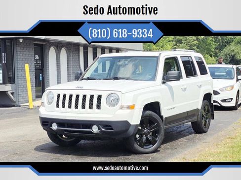 Used 2015 Jeep Patriot Limited w/ Sun/Sound Group AWD/4WD image 1