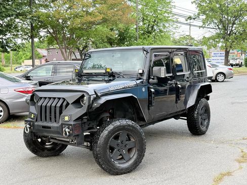 Used 2013 Jeep Wrangler Unlimited Sahara w/ Connectivity Group AWD/4WD image 2