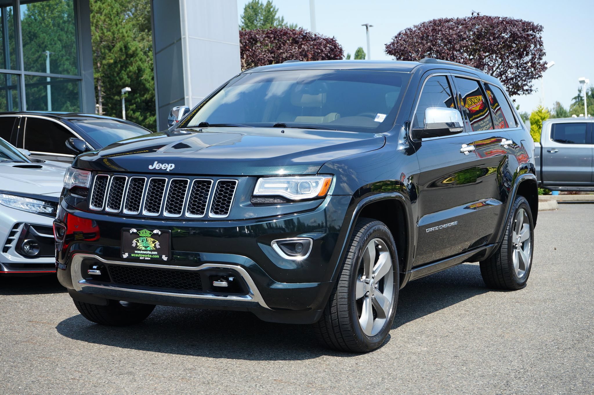 Used 2014 Jeep Grand Cherokee Overland AWD/4WD image 1