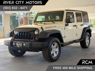 Used 2011 Jeep Wrangler Unlimited Rubicon w/ Dual Top Group