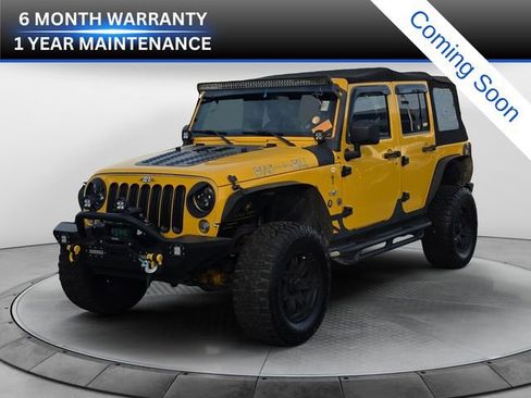 Used 2015 Jeep Wrangler Unlimited Sahara w/ Max Tow Package image 1