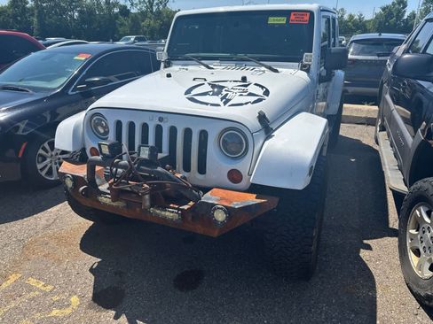 Used 2012 Jeep Wrangler Unlimited Sahara w/ Connectivity Group AWD/4WD image 1