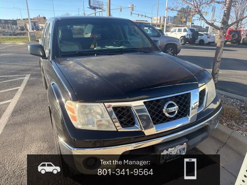 Used 2010 Nissan Frontier SE image 1