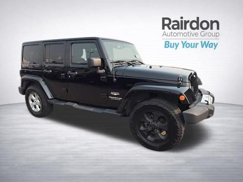 Used 2013 Jeep Wrangler Unlimited Sahara w/ Connectivity Group AWD/4WD image 1