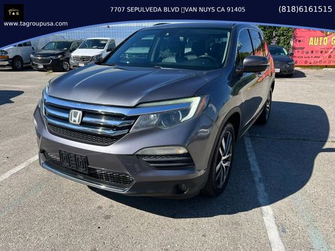 Used 2016 Honda Pilot Touring image 1