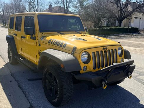 Used 2015 Jeep Wrangler Unlimited Sahara image 1