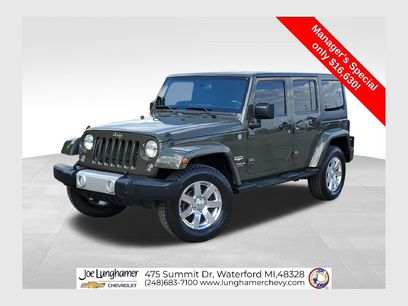 Used 2015 Jeep Wrangler Unlimited Sahara w/ Dual Top Group