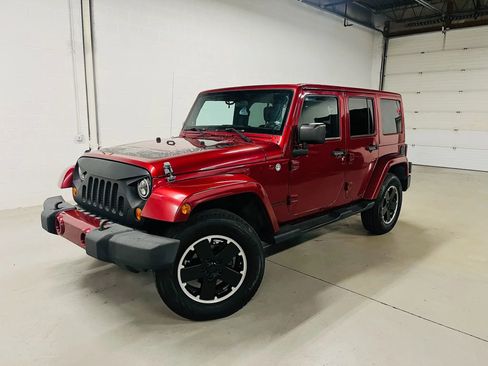 Used 2012 Jeep Wrangler Unlimited Sahara image 1