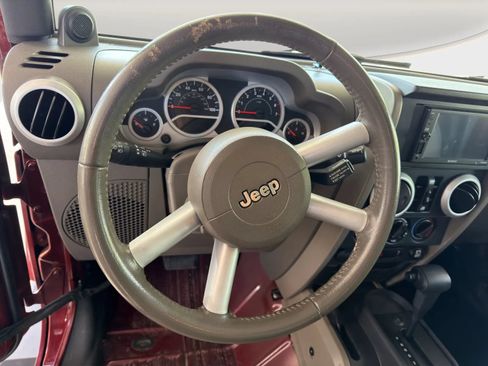 Used 2010 Jeep Wrangler Unlimited Sahara w/ Dual Top Group AWD/4WD image 9