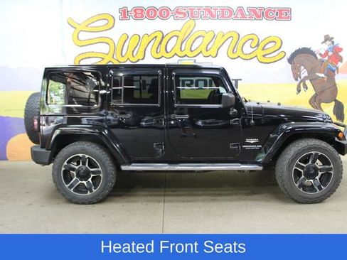 Used 2014 Jeep Wrangler Unlimited Sahara w/ Dual Top Group AWD/4WD image 1