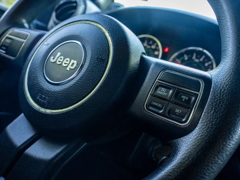Used 2013 Jeep Wrangler Unlimited Sport AWD/4WD image 23