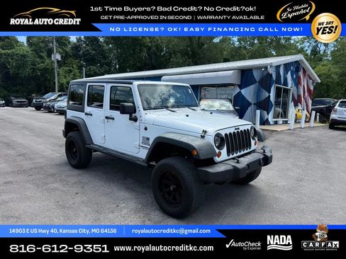 Used 2013 Jeep Wrangler Unlimited Sport w/ Dual Top Group AWD/4WD image 1