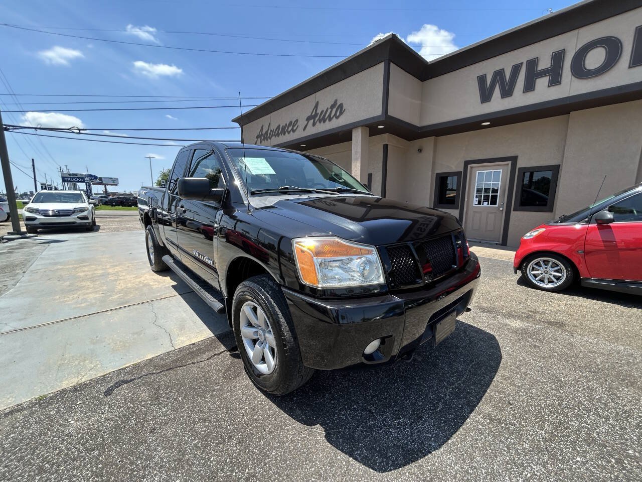 Used 2012 Nissan Titan SV w/ SV Value Truck Pkg AWD/4WD image 2