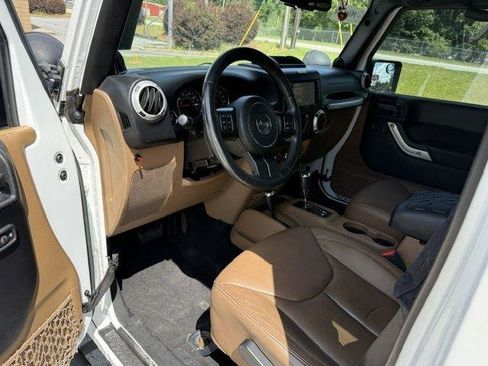 Used 2013 Jeep Wrangler Unlimited Sahara w/ Dual Top Group AWD/4WD image 9