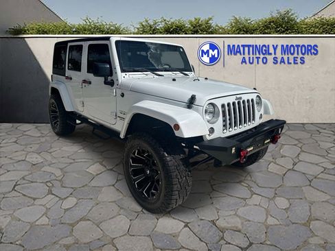 Used 2016 Jeep Wrangler Unlimited Sahara w/ Connectivity Group AWD/4WD image 1