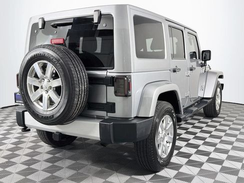 Used 2013 Jeep Wrangler Unlimited Sahara w/ Dual Top Group AWD/4WD image 25