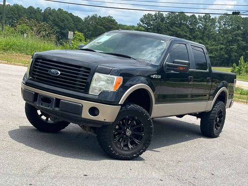 Used 2012 Ford F150 Lariat RWD image 1