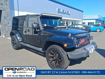 Used 2014 Jeep Wrangler Unlimited Sahara w/ Dual Top Group