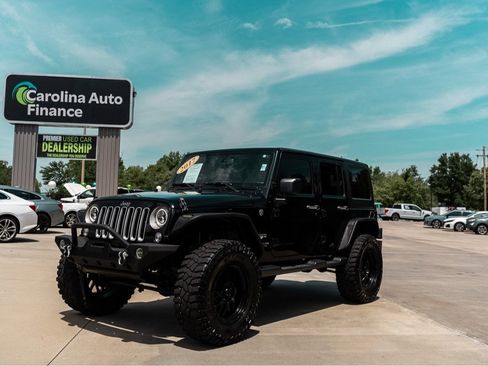 Used 2017 Jeep Wrangler Unlimited Sahara AWD/4WD image 1
