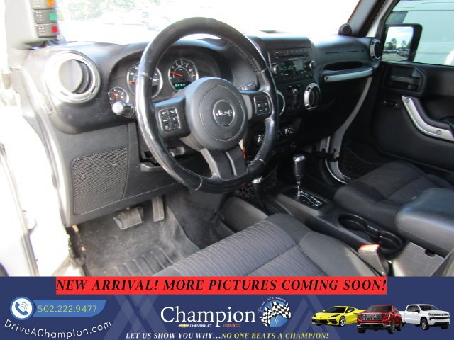 Used 2012 Jeep Wrangler Unlimited Sahara w/ Dual Top Group AWD/4WD image 11