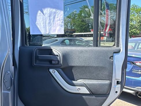 Used 2016 Jeep Wrangler Unlimited Sahara w/ Dual Top Group AWD/4WD image 16