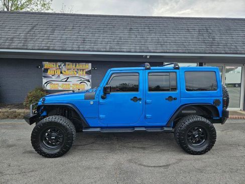 Used 2014 Jeep Wrangler Unlimited Sahara image 1