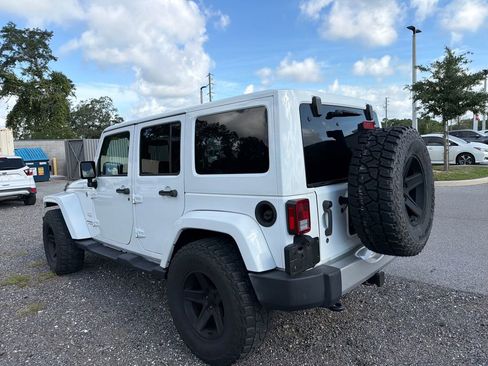 Used 2015 Jeep Wrangler Unlimited Sahara w/ Dual Top Group AWD/4WD image 7
