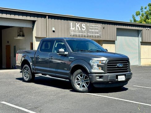 Used 2015 Ford F150 XLT w/ Equipment Group 302A Luxury AWD/4WD image 1